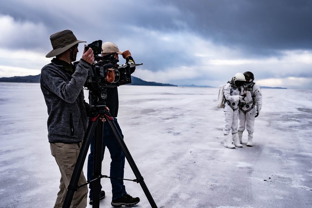 rob filming astronauts in salt flats